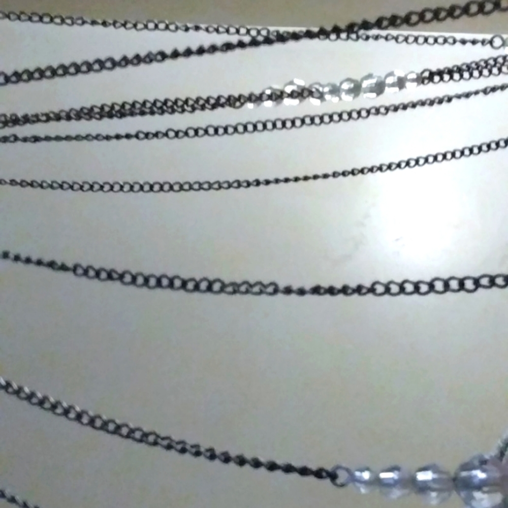 Faux crystal multi-chain necklace.